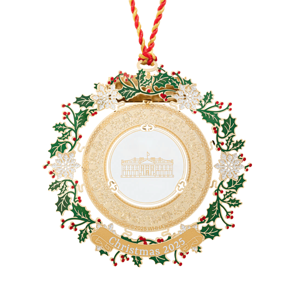 2025 Presidential China Ornament featuring a brass construction with 24K gold finish and detailed holiday designs, displayed on a festive tree.