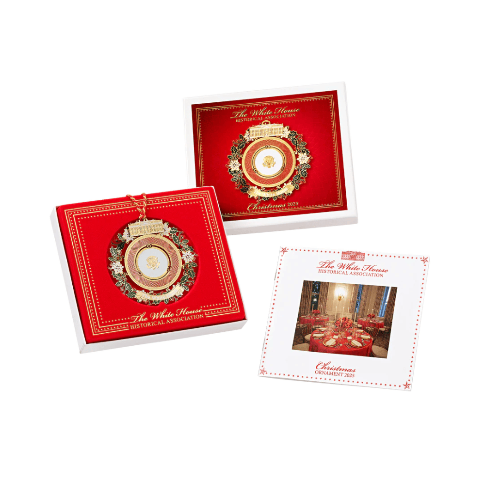 2025 Presidential China Ornament featuring a brass construction with 24K gold finish and detailed holiday designs, displayed on a festive tree.