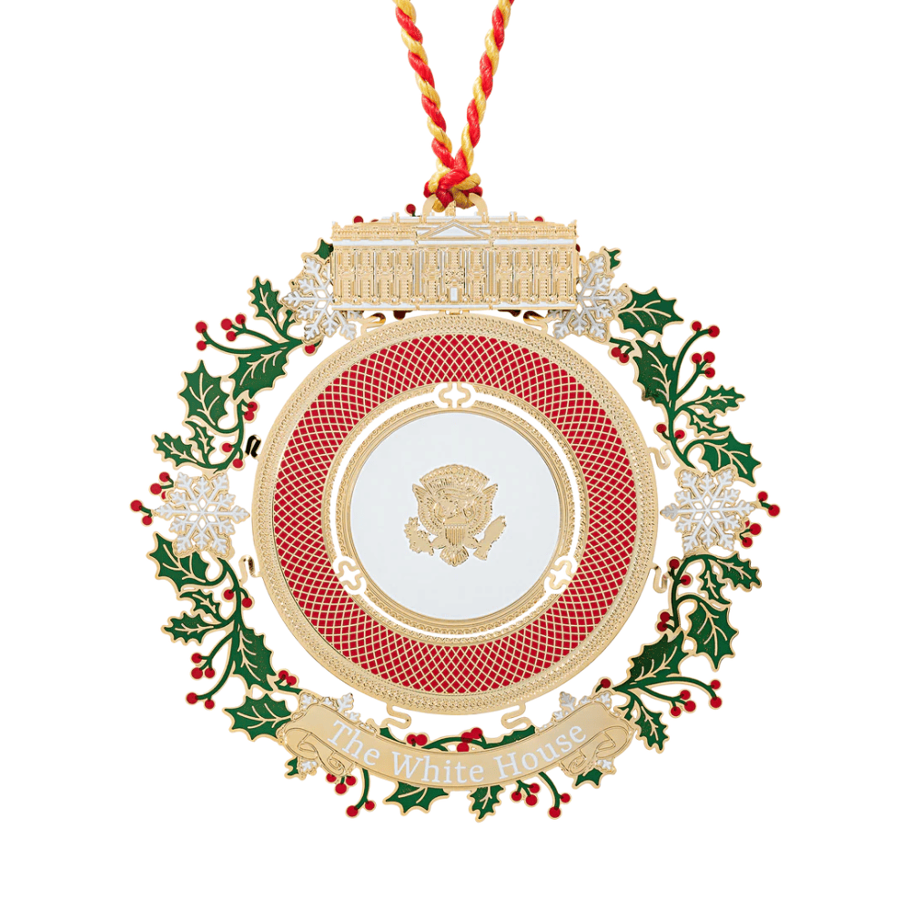 2025 Presidential China Ornament featuring a brass construction with 24K gold finish and detailed holiday designs, displayed on a festive tree.