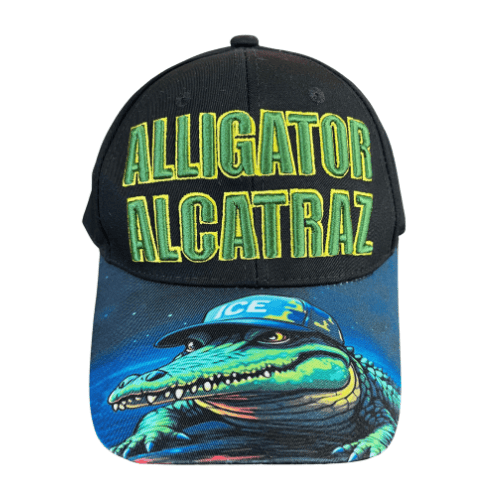 Alligator Alcatraz Black Hat featuring bold embroidered lettering and a fierce alligator artwork on the bill, displayed against a plain background.