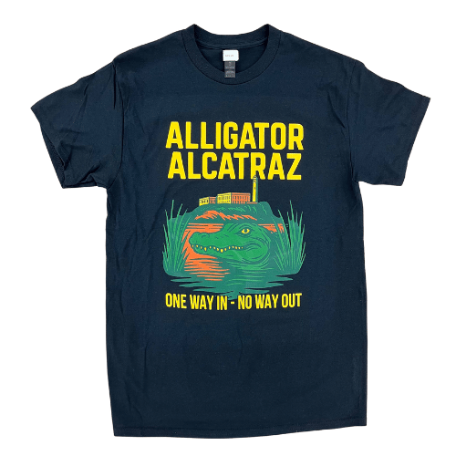 Alligator Alcatraz T-Shirt showcasing a vivid alligator design with Alcatraz prison silhouette on a black background, ideal for graphic tee fans.