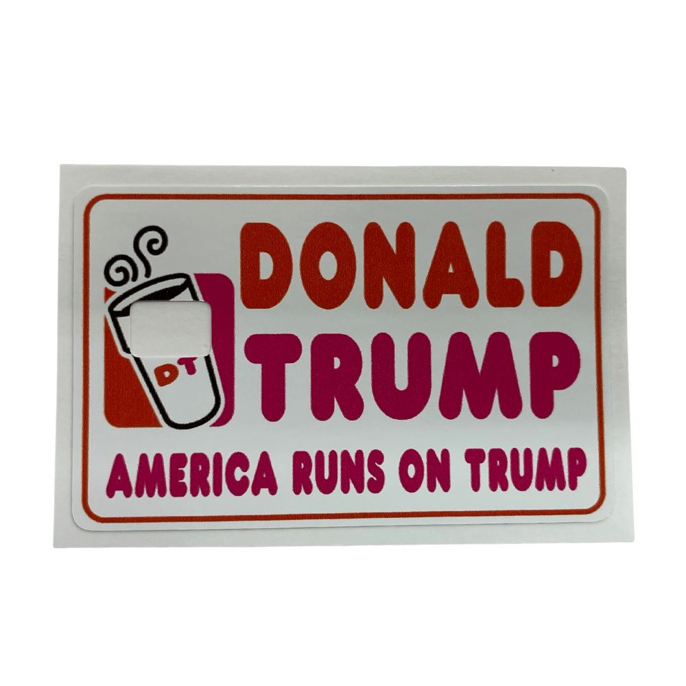 America Runs on Trump credit card cover featuring a coffee cup graphic with vibrant colors placed next to a standard credit card in a wallet.