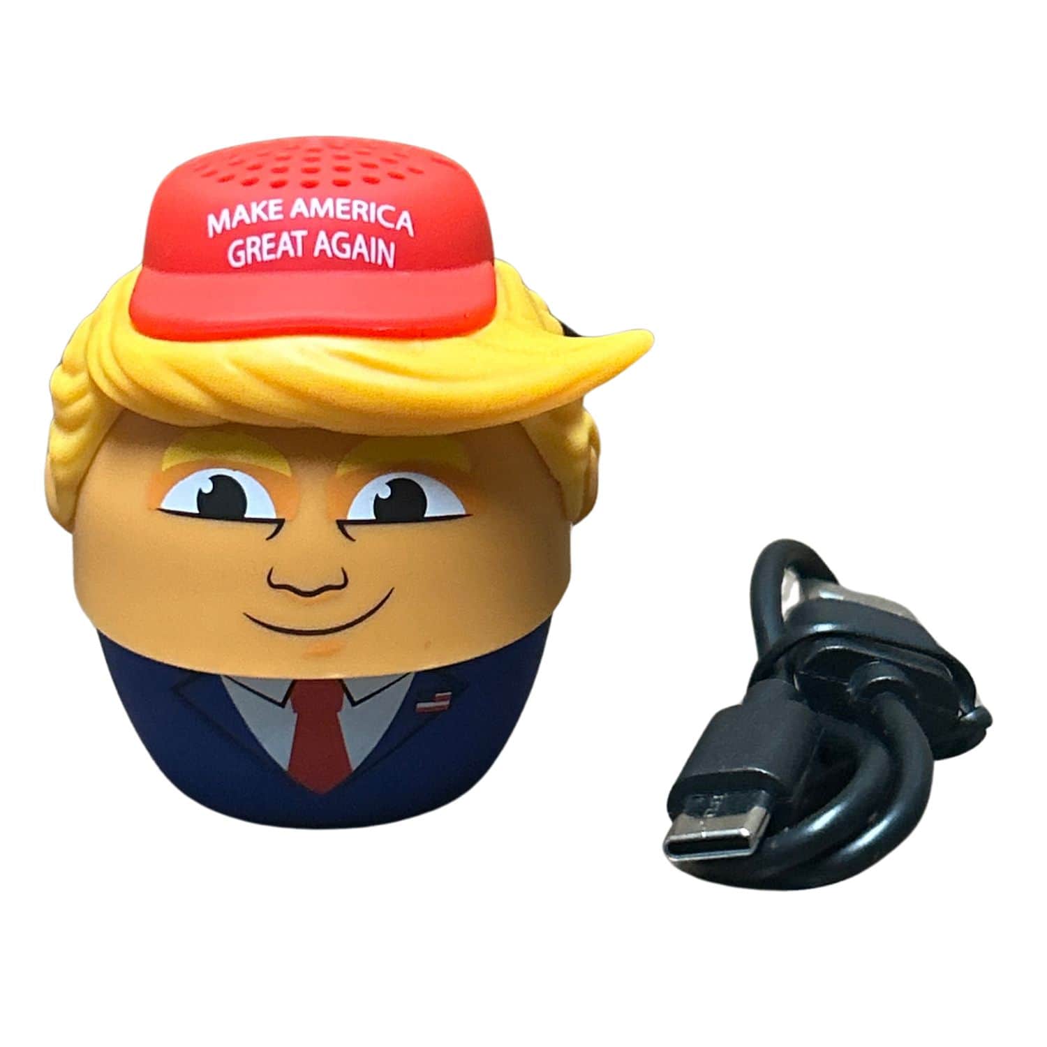 Donald Trump Wireless Bluetooth Speaker shaped like a cartoon Trump wearing a red MAGA hat, showcasing its fun design and compact size.