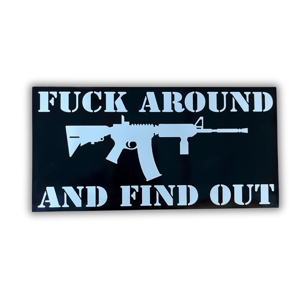 Fuck Around Rifle bumper sticker featuring bold patriotic design affixed to a car bumper in a sunny outdoor setting.