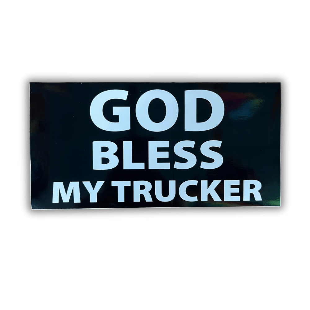 God Bless My Trucker bumper sticker featuring a bold patriotic design, adhered to a vehicle bumper in a sunny outdoor setting.