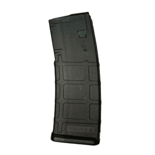 Let's Go Brandon 5.56 30-Round PMAG featuring a playful custom print, displayed alongside a firearm on a shooting range.