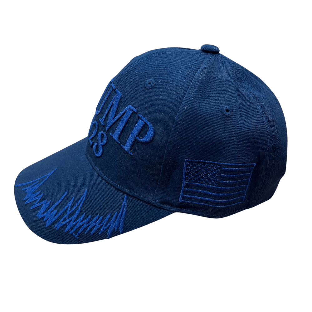 Navy Trump 2028 Signature Hat with tone-on-tone embroidery, U.S. flag, and Presidential Seal, displayed on a table against a neutral background.