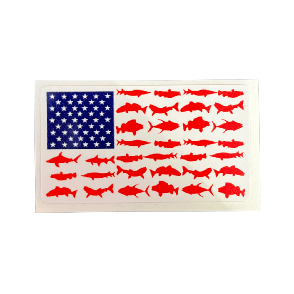 Patriotic Fish USA Flag Sticker featuring a colorful design of a fish wrapped in the American flag, applied on a laptop surface.