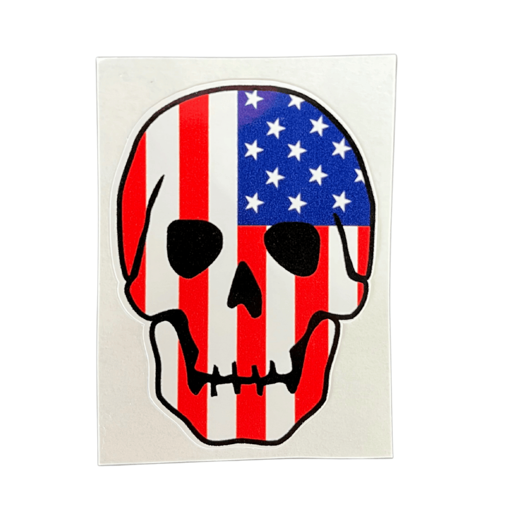 Durable Patriotic USA Skull Sticker featuring an American flag-inspired skull design, displayed on a laptop for a bold patriotic look.