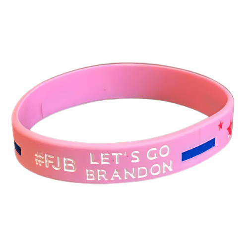 Vibrant pink rubber bracelet featuring the phrase 'Let's Go Brandon!' showcasing a bold political statement in an outdoor setting.