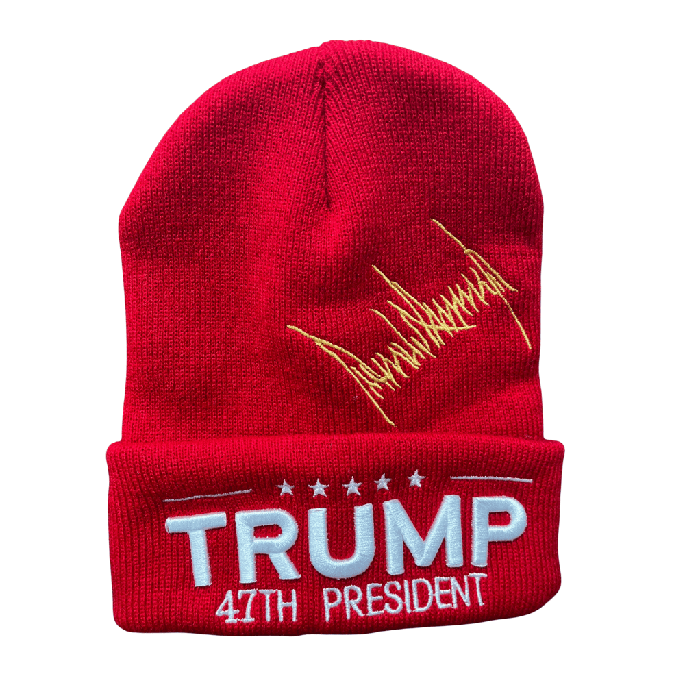 Red Trump 47th President Beanie featuring white embroidery and gold signature, displayed against a neutral backdrop to highlight its design.
