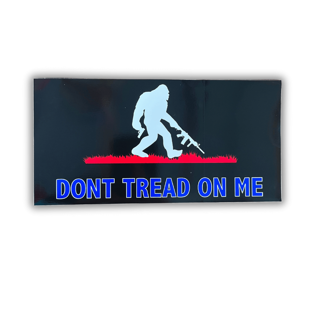 Sasquatch Tread On Me bumper sticker, approximately 7.5x4 inches, with vibrant design showcased on a car bumper in a sunny outdoor setting.