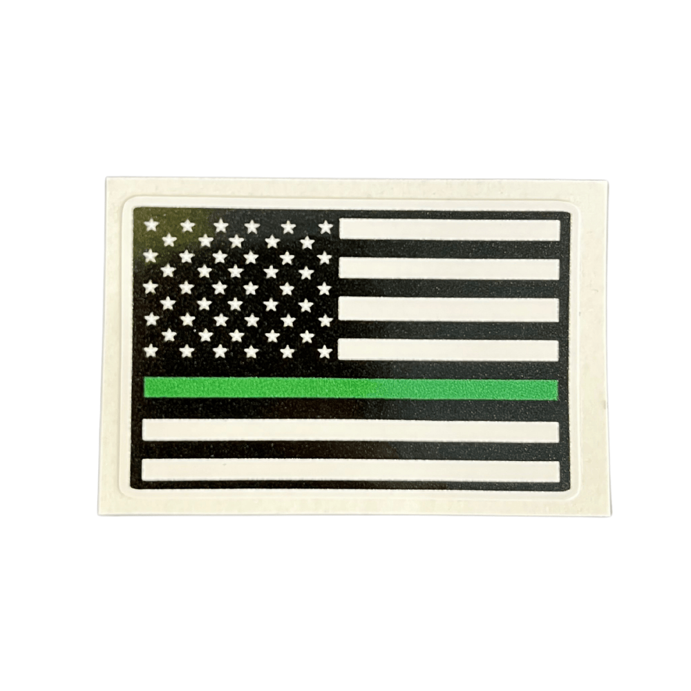Thin Green Line sticker showcasing a bold green stripe on a durable vinyl surface, ready to apply on any smooth surface for personal expression.