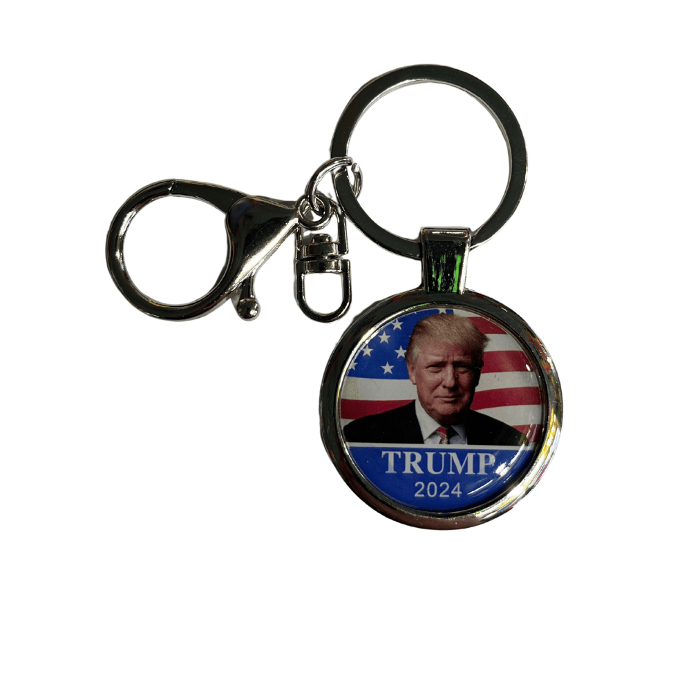 Trump 2024 Flag Portrait Keychain displaying a round design with the American flag background and Donald Trump's portrait inside a polished metal frame.