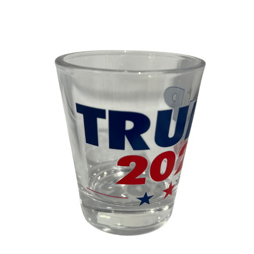 Trump 2024 shot glass featuring bold navy lettering and stars in red and blue, ideal for patriotic supporters.