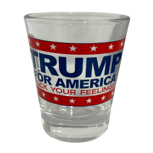 Trump F Your Feelings shot glass featuring a clear design, bold 'TRUMP FOR AMERICA' text, and 'F * YOUR FEELINGS' slogan against red and white stripes.