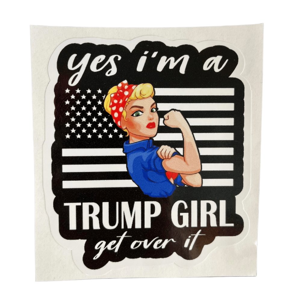 Trump Girl Black Out Flag Sticker displayed on a car bumper, showing patriotic design and vibrant colors on a smooth surface.
