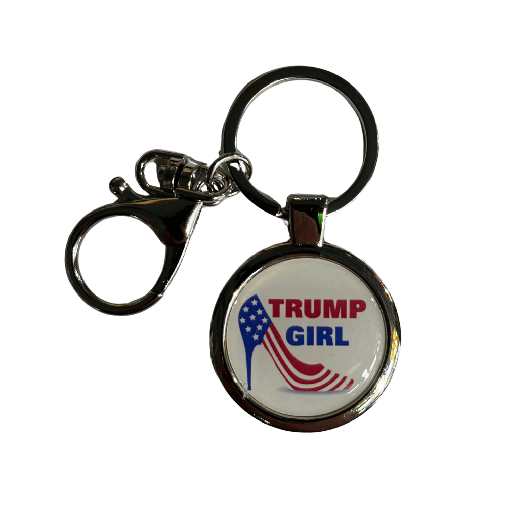 Trump Girl Patriotic Keychain featuring a bold red and blue design with an American flag graphic, suspended from a polished silver-tone frame.