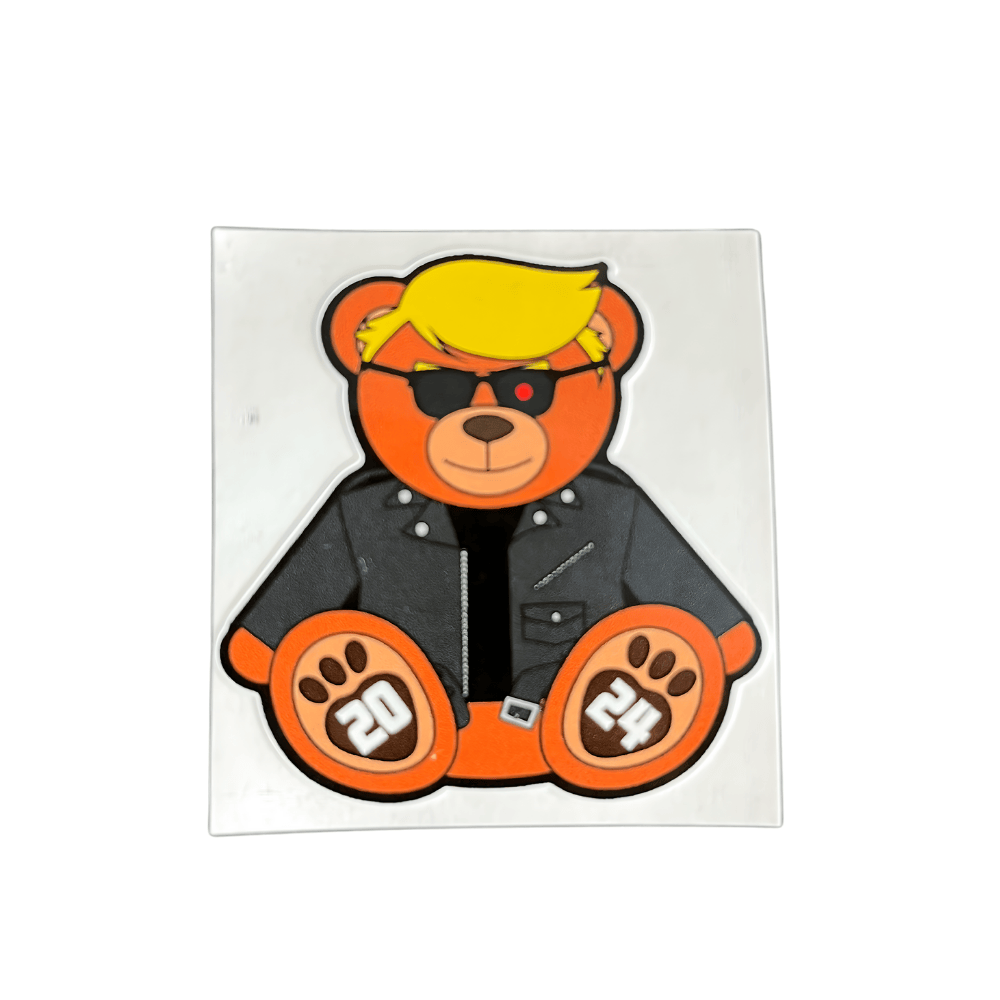 Trump Terminator Teddy Bear Sticker featuring vibrant American-themed design displayed on a smooth surface, ideal for outdoor and indoor use.