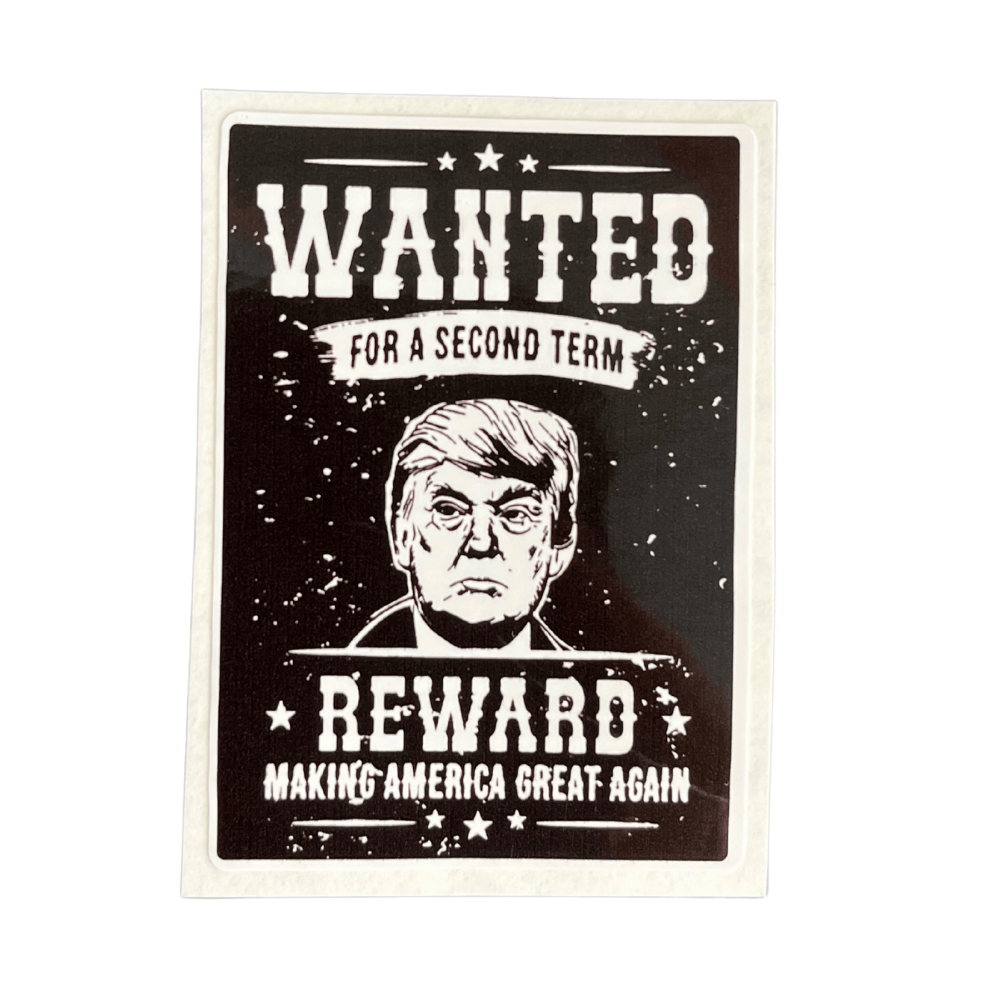 Trump WANTED sticker featuring bold American political themes displayed on a smooth surface like a car or laptop.