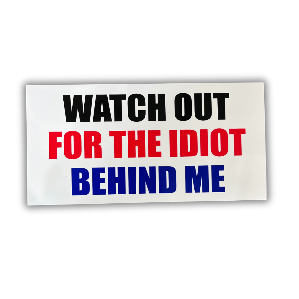 Watch Out For The Idiot bumper sticker made from weatherproof vinyl displayed on a car's rear bumper highlighting its bold design.