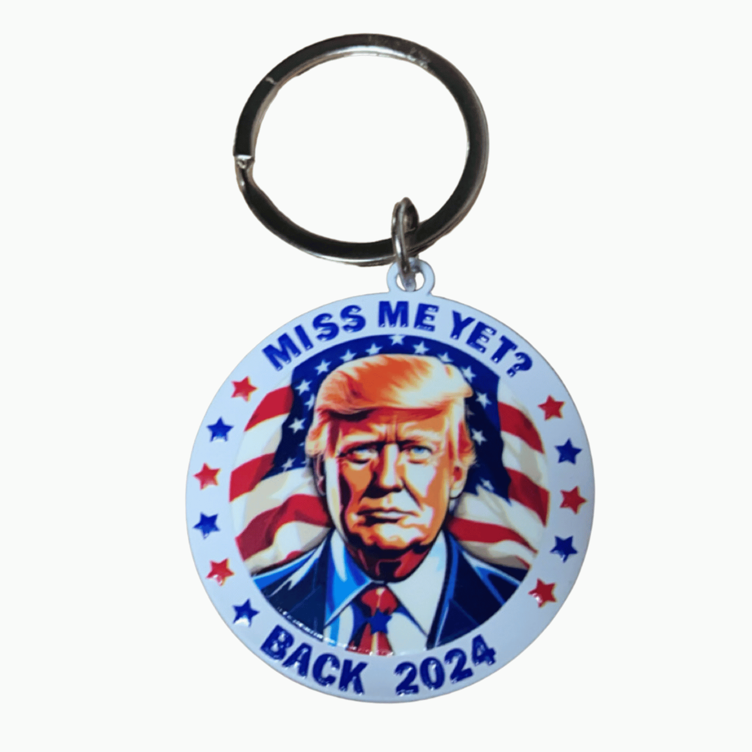 White Miss Me Yet Donald Trump Back 2024 Keychain featuring Trump's portrait surrounded by the American flag and stars, perfect for key organization.