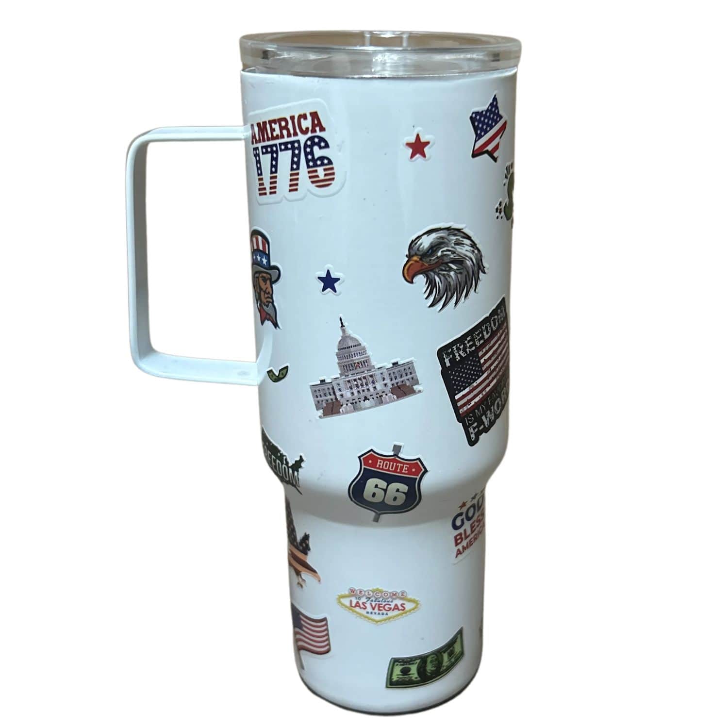 White Patriotic Mini Tumbler featuring vibrant American flag, eagle, and star designs, held in hand against a festive backdrop.
