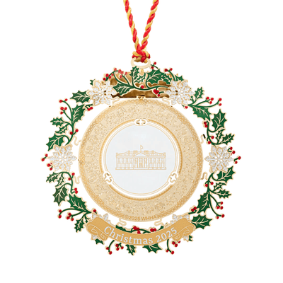 2025 Presidential China Ornament featuring a brass construction with 24K gold finish and detailed holiday designs, displayed on a festive tree.