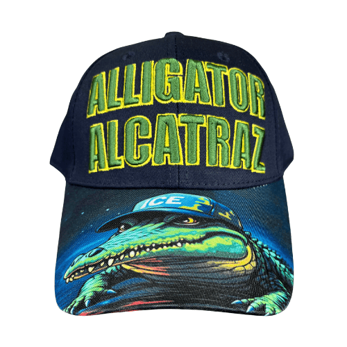 Alligator Alcatraz Navy Hat with bold green and yellow embroidery on a deep navy blue base, featuring a colorful illustration of an alligator on the bill.