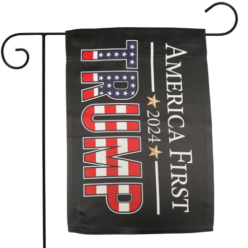 America First Patriotic Trump 2024 Black Garden Flag featuring bold lettering against a black background, displayed in an outdoor garden setting.