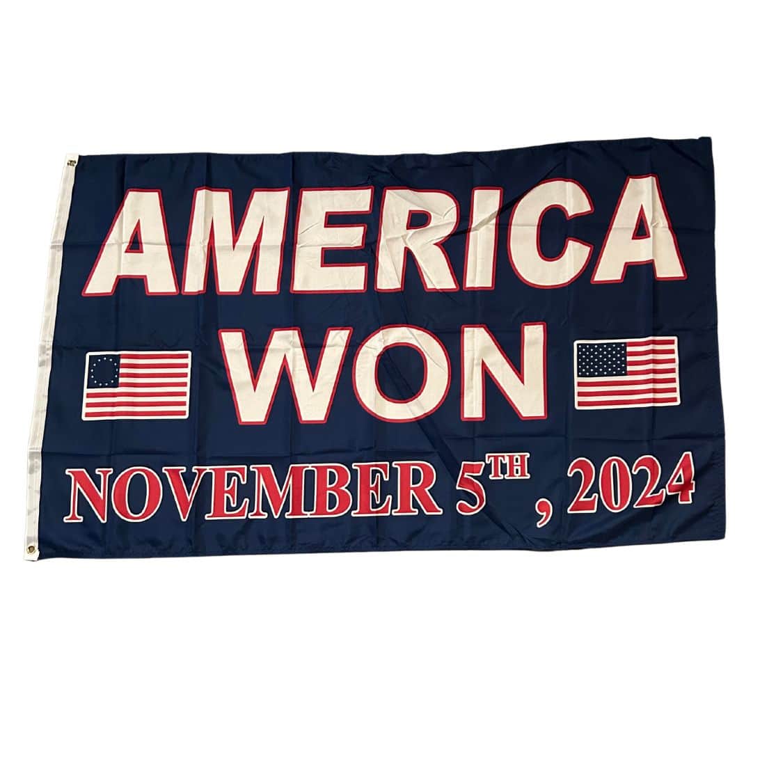 America Won Nov 5th 2024 Flag with vibrant colors and bold lettering, waving proudly in an outdoor setting.