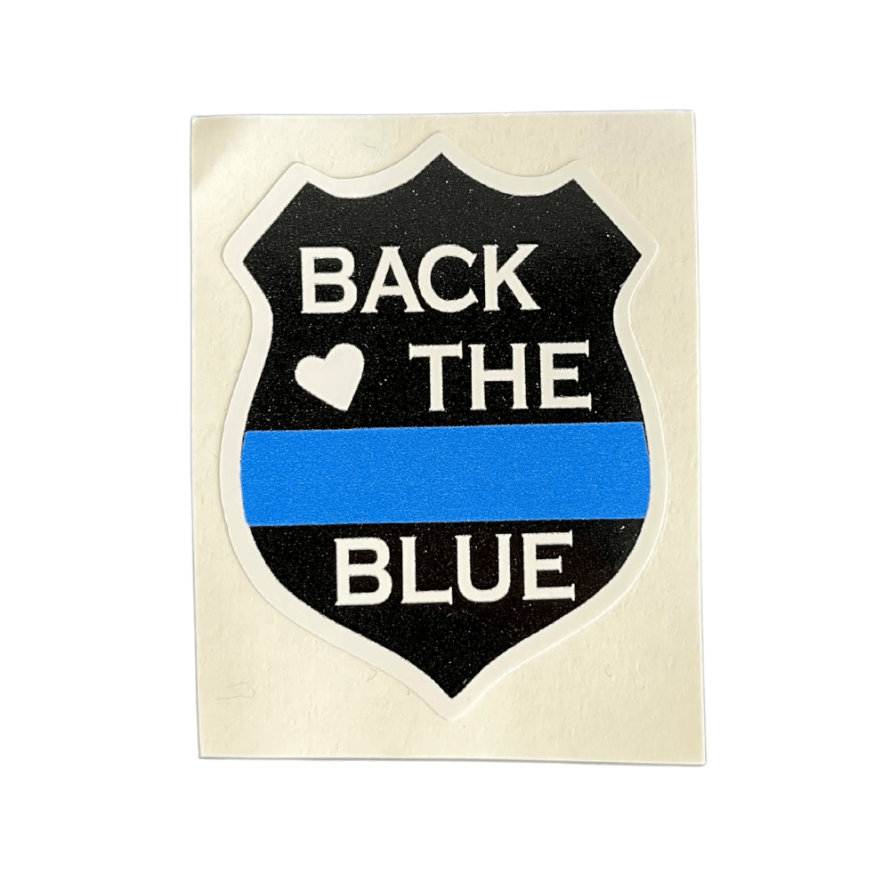 Back The Blue Shield Sticker showcasing vibrant colors and bold design, displayed on a laptop and ready for various smooth surfaces.