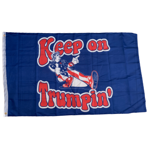 Blue Keep On Trumpin' 3x5 flag featuring bold text on a vibrant blue background, displayed outdoors with real brass grommets.