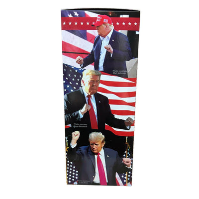 Dancing Trump Bobble Head in a black suit with a red tie, energetically posed on a red base, bringing a humorous vibe to any display area.