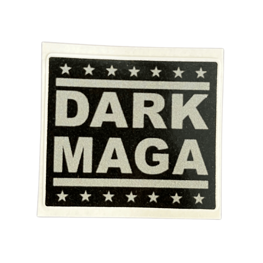 Dark MAGA Sticker displayed on a laptop, showcasing bold American-themed artwork in a weather-resistant adhesive vinyl design.