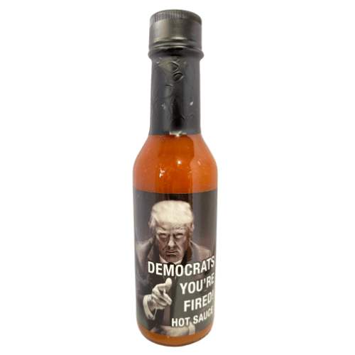 Democrats You're Fired Hot Sauce bottle featuring President Trump's iconic 'You're fired!' pose, designed to bring humor and heat to any meal.