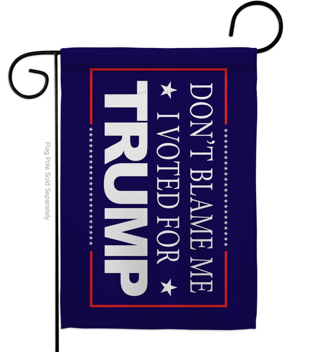 Don't Blame Me I Voted For Trump double-sided blue garden flag displayed prominently on an outdoor pole in a vibrant outdoor setting.