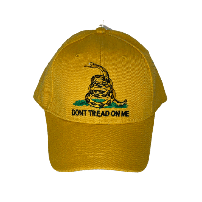Don't Tread On Me Hat featuring the iconic Gadsden snake emblem in vibrant yellow, worn outdoors displaying a statement of liberty.