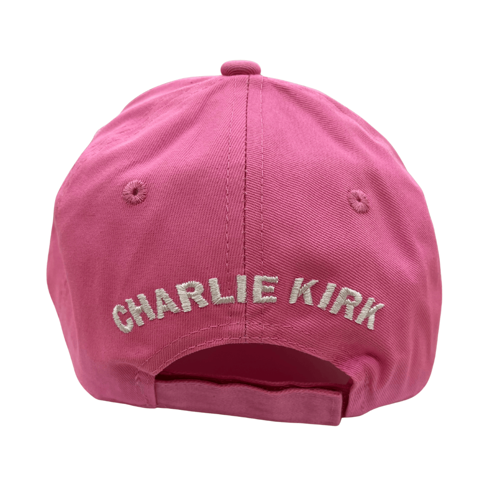 I Am Charlie Pink Hat featuring bold white embroidery, 'I AM CHARLIE' on the front and 'CHARLIE KIRK' on the back, displayed outdoors.