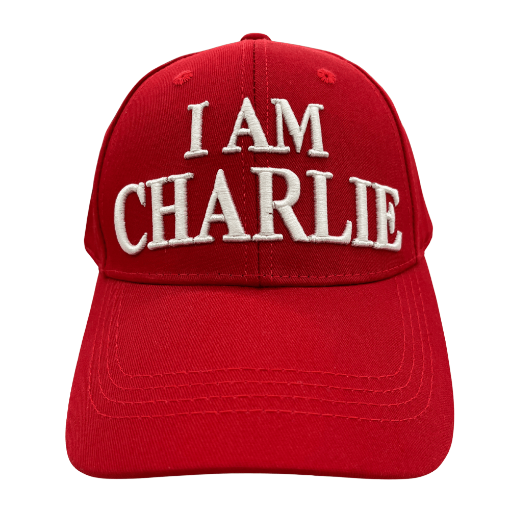 I Am Charlie Red Hat featuring white 'I AM CHARLIE' embroidery on a vibrant red cotton twill base, ideal for patriotic events.