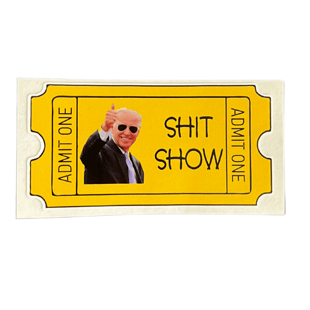Joe Biden Shit Show Ticket Sticker featuring bold political design for outdoor use displayed on a laptop in a sunny setting.