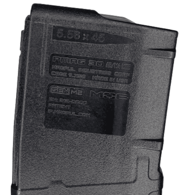 Let's Go Brandon 5.56 30-Round PMAG featuring a playful custom print, displayed alongside a firearm on a shooting range.