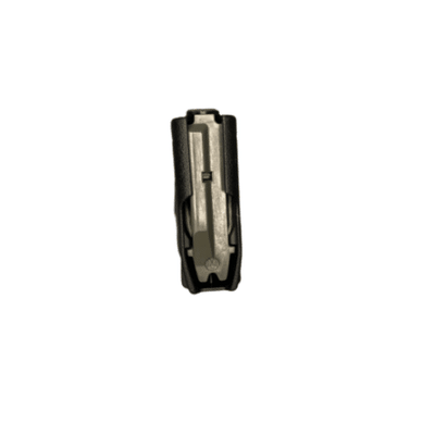 Let's Go Brandon 5.56 30-Round PMAG featuring a playful custom print, displayed alongside a firearm on a shooting range.