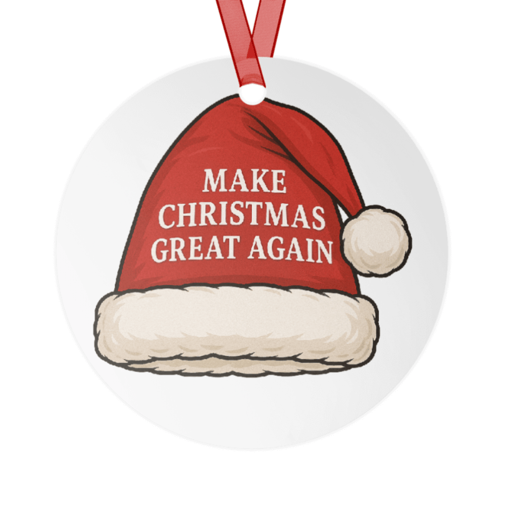 Make Christmas Great Again Aluminum Ornament featuring a red Santa hat design and bold white lettering, hanging on a Christmas tree.