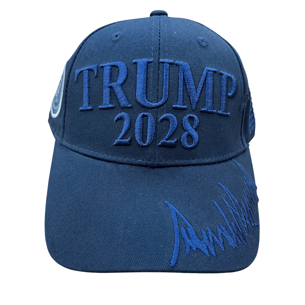 Navy Trump 2028 Signature Hat with tone-on-tone embroidery, U.S. flag, and Presidential Seal, displayed on a table against a neutral background.