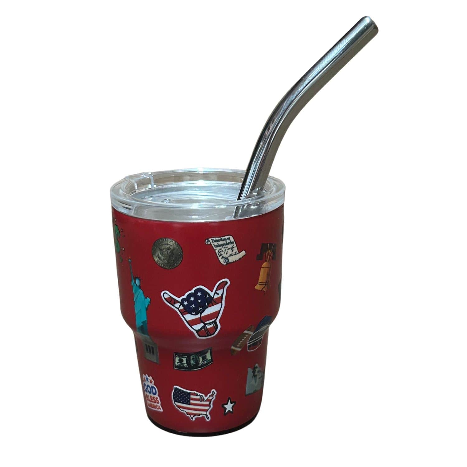 Patriotic Metal Shot Glass with shiny red finish featuring 'USA,' flags, and eagle designs held against a festive backdrop.