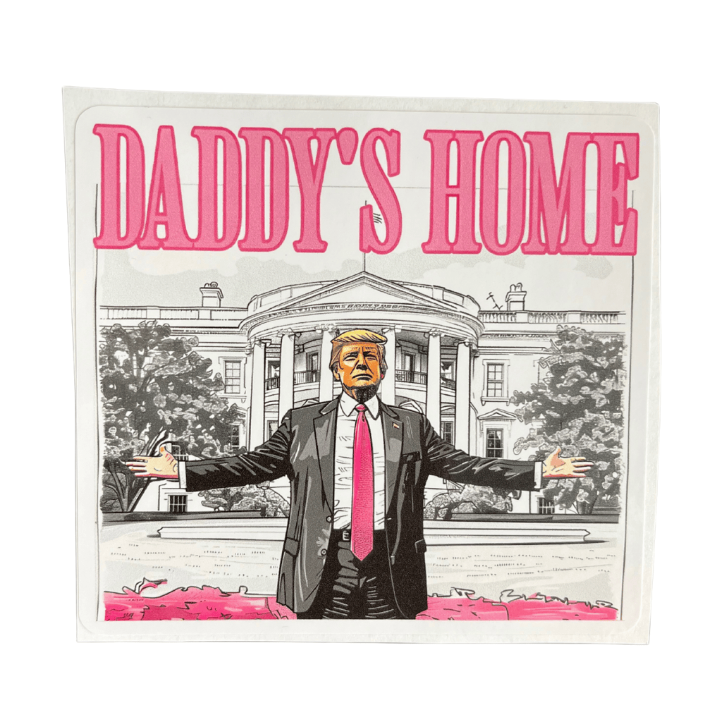 Pink Daddy's Home sticker featuring bold, patriotic design, showcasing vibrant colors on a smooth surface.