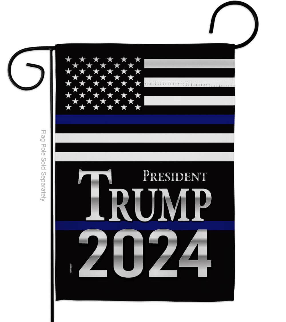Visualize the President Trump Blue USA garden flag-a double-sided patriotic garden flag featuring bold blue American colors and messaging displayed prominently in a garden setting.
