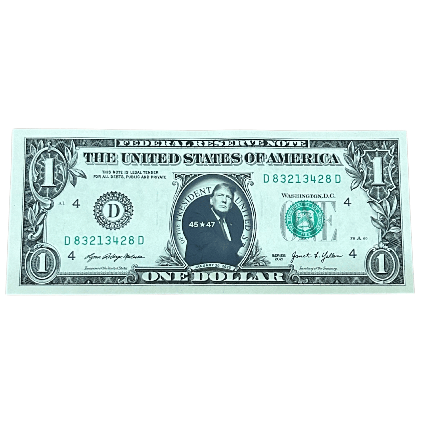 President Trump Dollar featuring a laminated sticker of Donald Trump over George Washington's portrait, displayed in a decorative frame.