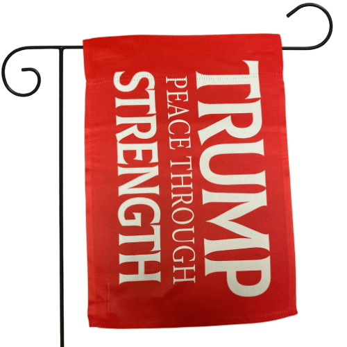 Red Trump Peace Through Strength garden flag featuring bold slogan displayed in an outdoor garden setting, showcasing durability and vibrant colors.